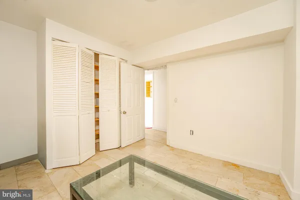 a view of a room with table and chair