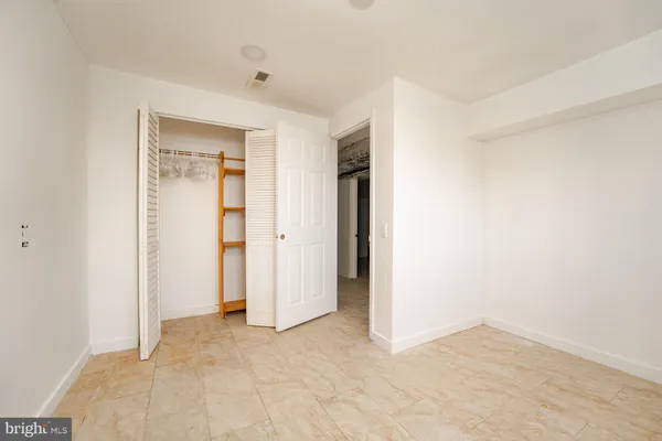a view of livingroom with kitchen
