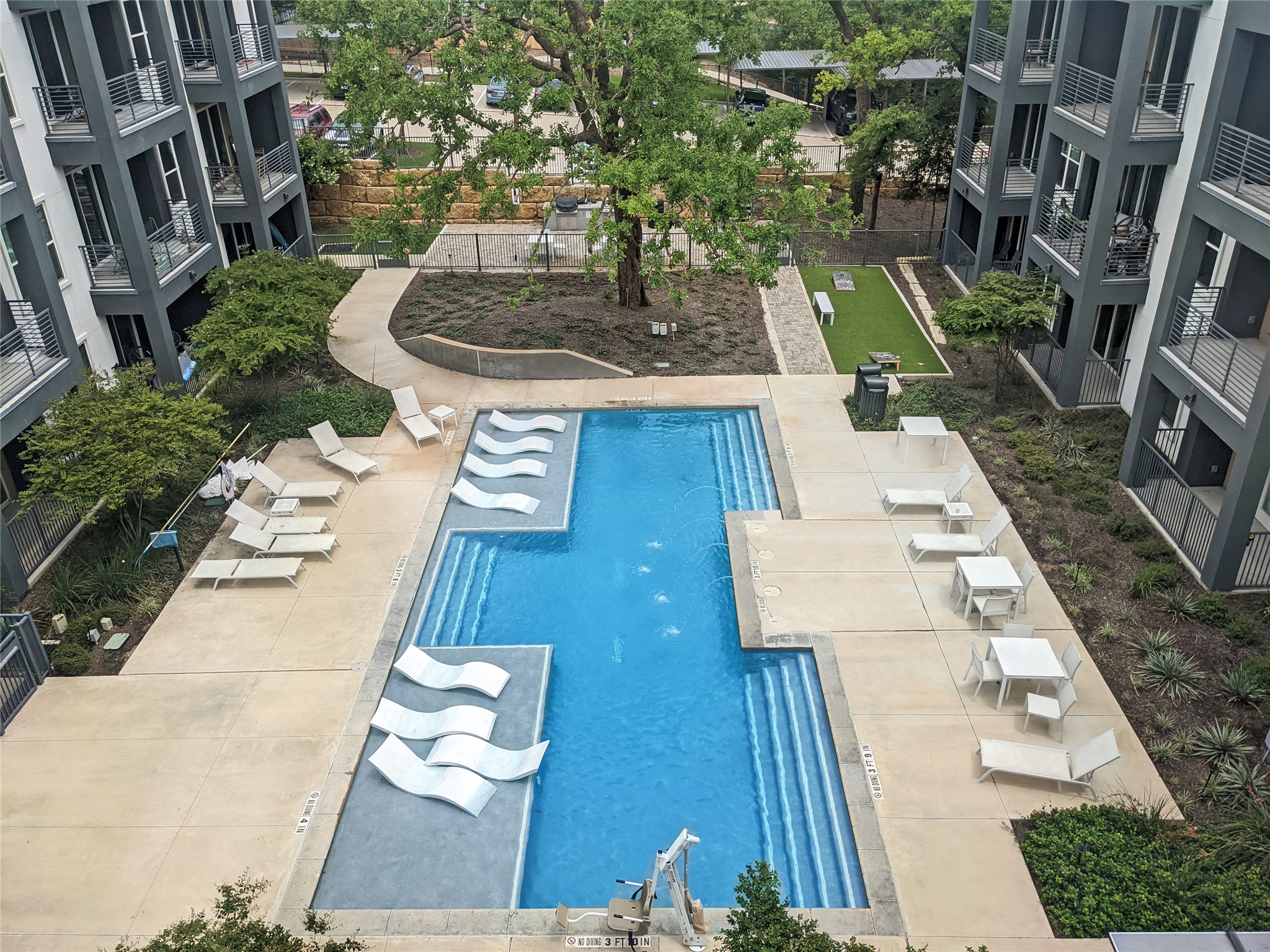 4801 Springdale Road, Unit 2309 Austin, TX 78723 - Photo 13 of 15 Unwind by the resort-style pool on warm afternoons, where you can swim laps, soak up the sun, or lounge by the water with neighbors
