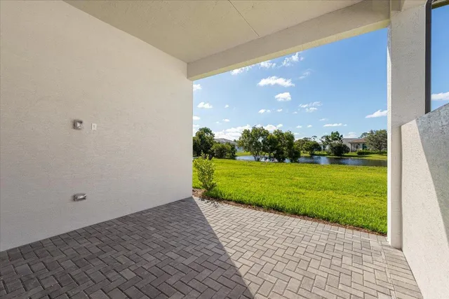 a view of a back yard of the house