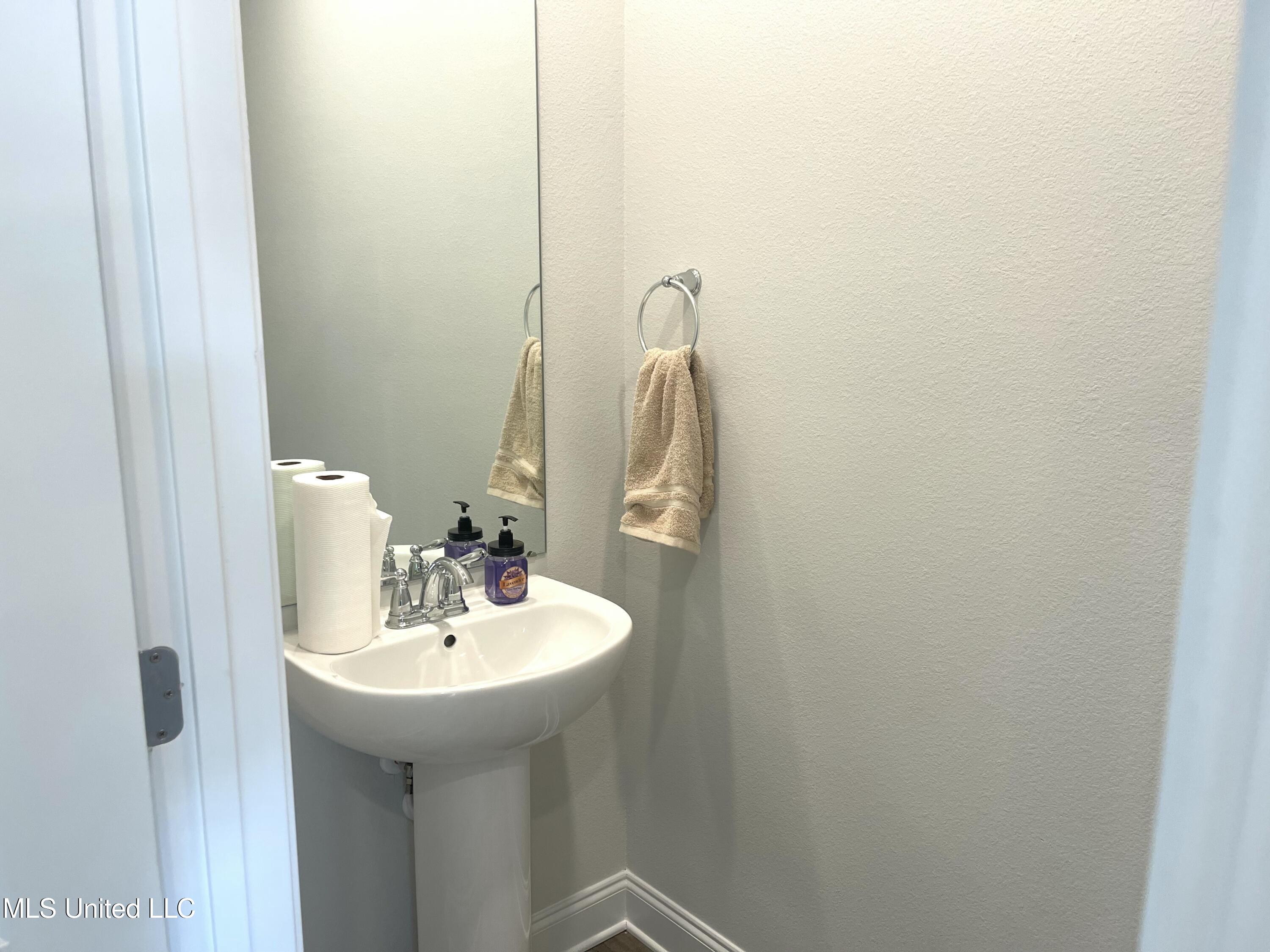 128 Debuys Road Biloxi, MS 39531 - Photo 8 of 18 Downstairs Half Bathroom
