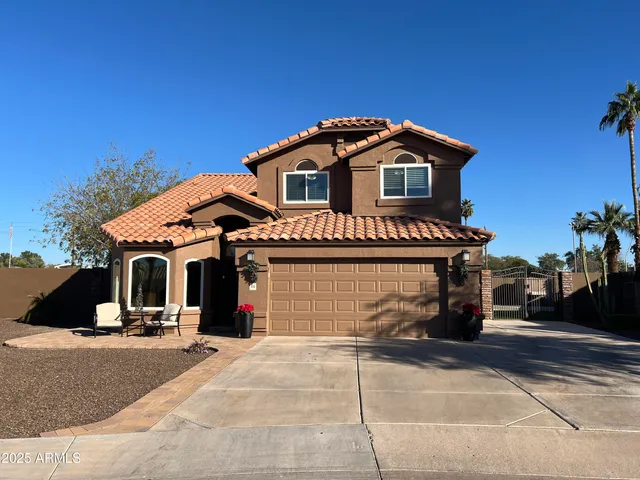a front view of a house with a garage