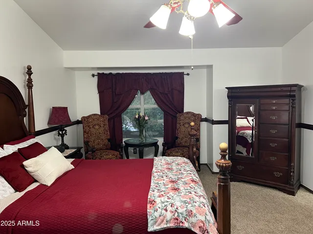 a view of an outdoor dining space with a table chairs and a table