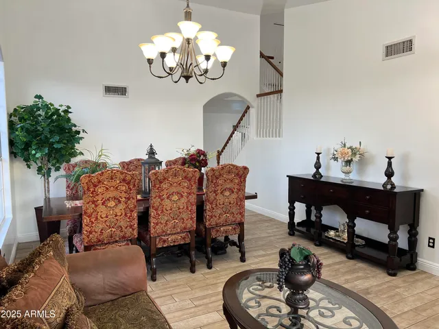 a white toilet sitting next to a small sink