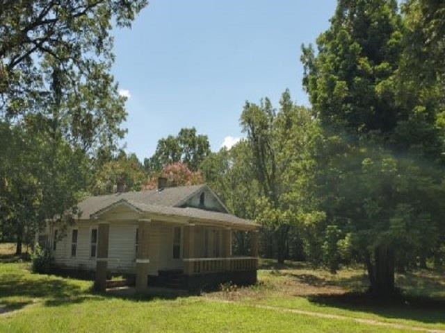 398 Tappah Street Grand Junction, TN 38039 - Photo 2 of 12 a front view of a house with garden