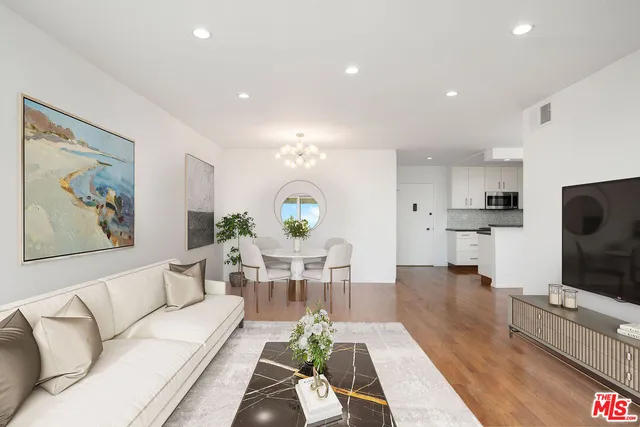 a bathroom with a sink toilet and mirror