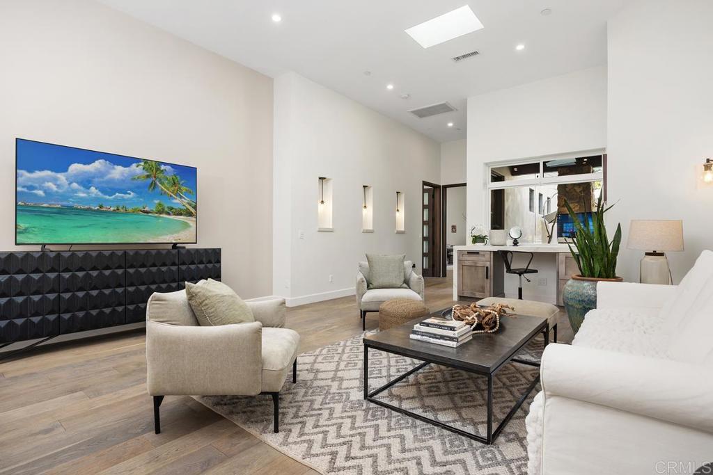 1240 Berryman Canyon Encinitas, CA 92024 - Photo 17 of 64 a living room with furniture and a flat screen tv
