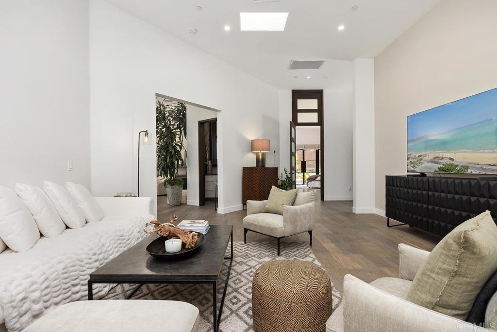 1240 Berryman Canyon Encinitas, CA 92024 - Photo 18 of 64 a living room with furniture and wooden floor