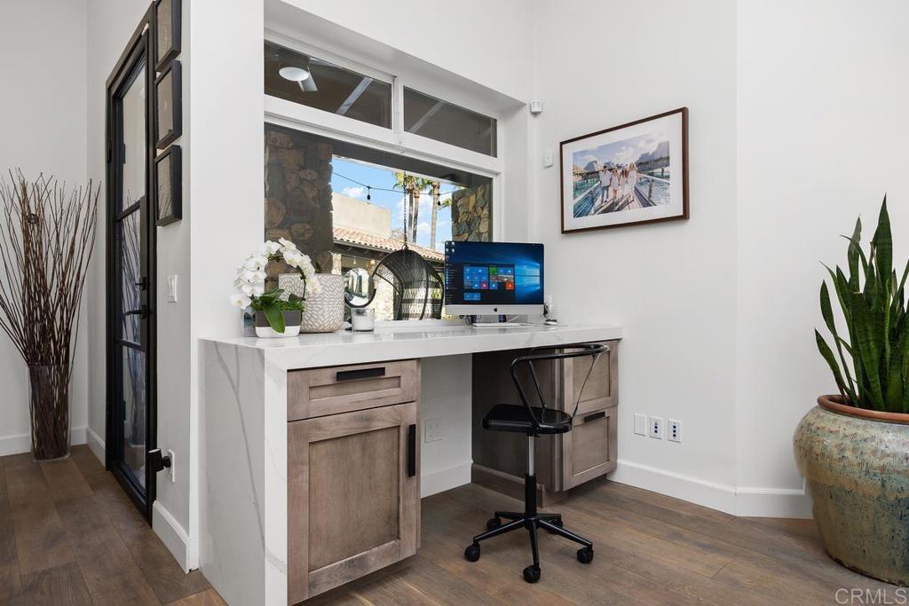 1240 Berryman Canyon Encinitas, CA 92024 - Photo 19 of 64 a view of workspace with a flat screen tv