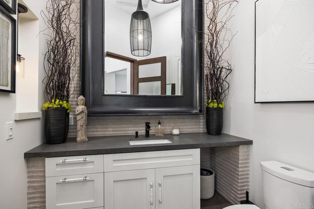 1240 Berryman Canyon Encinitas, CA 92024 - Photo 20 of 64 a sink with a toilet