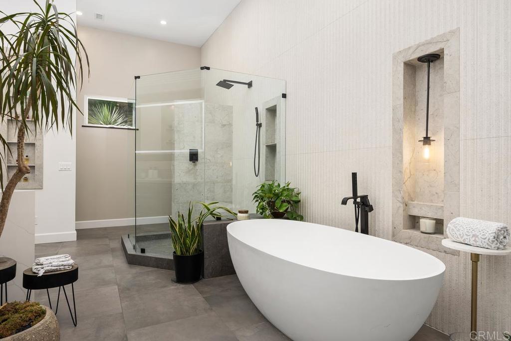 1240 Berryman Canyon Encinitas, CA 92024 - Photo 26 of 64 a white bath tub sitting in a bathroom and bathroom