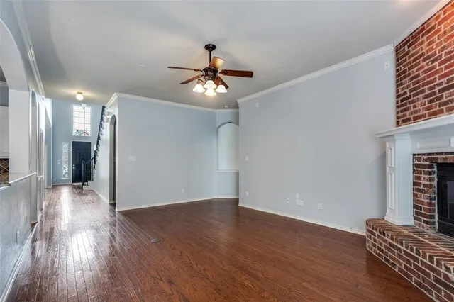 a view of livingroom with hardwood floor and ceiling fan