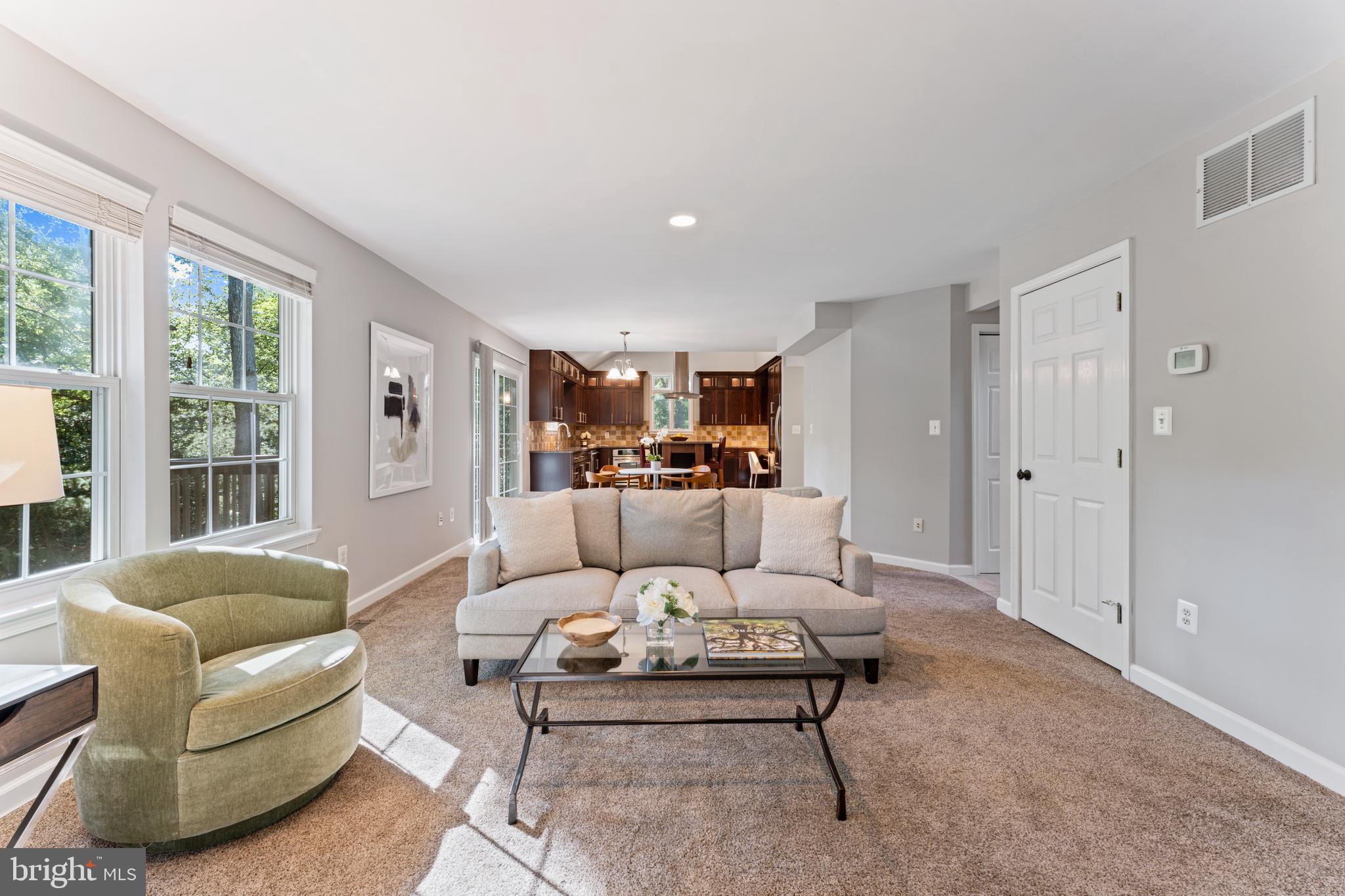 1555 Wall Drive Pasadena, MD 21122 - Photo 1 of 46 a living room with furniture and a large window