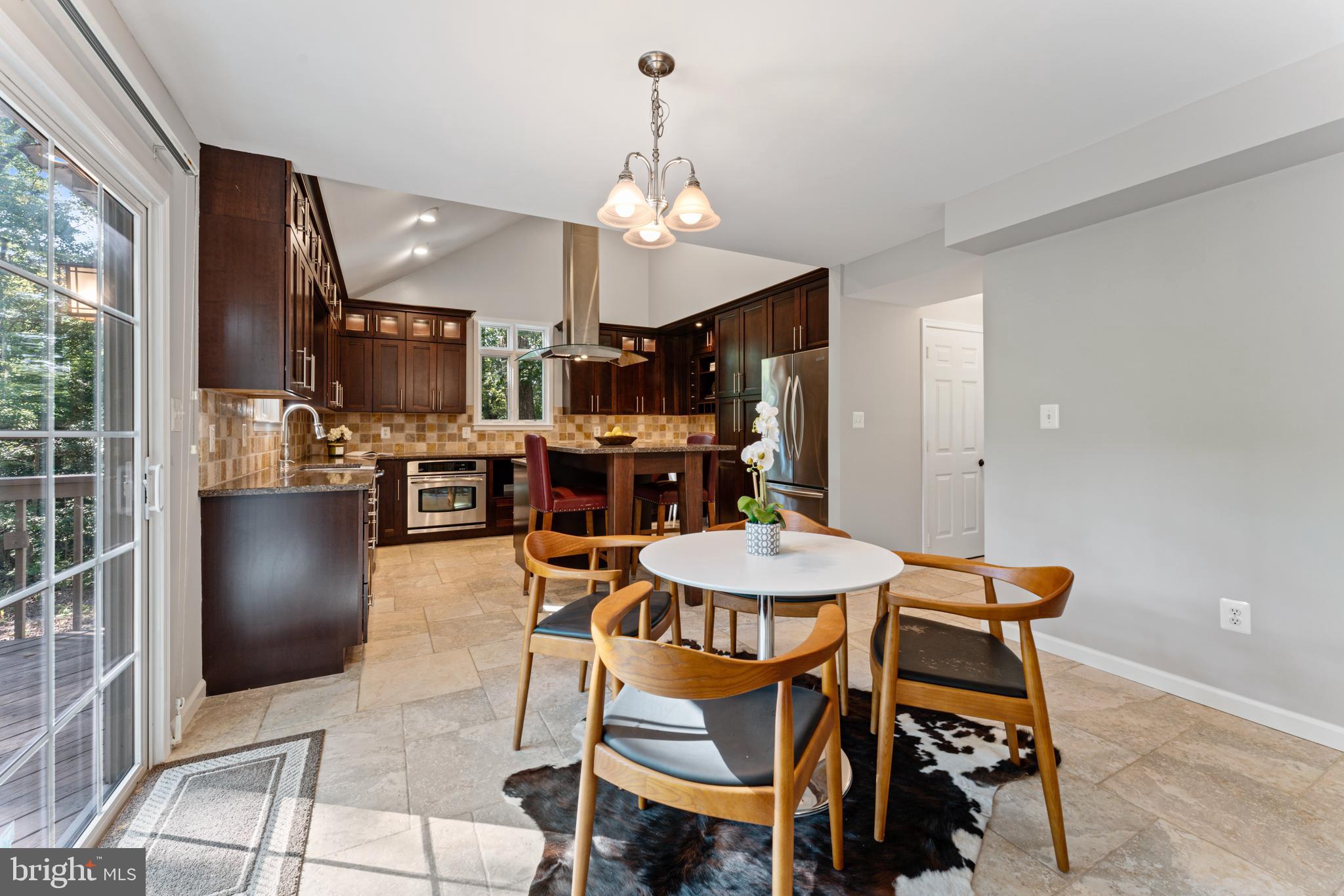 1555 Wall Drive Pasadena, MD 21122 - Photo 11 of 46 a view of a dining room with furniture