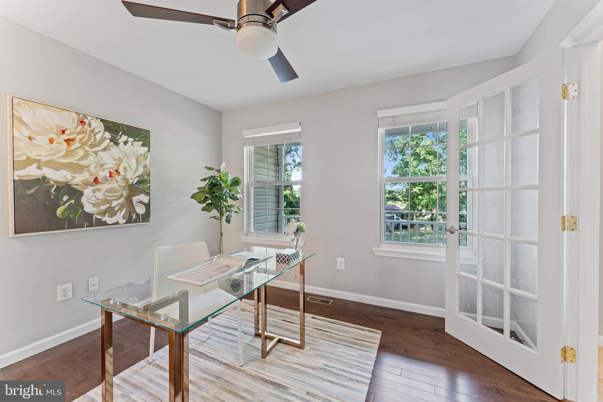 1555 Wall Drive Pasadena, MD 21122 - Photo 16 of 46 a workspace with wooden floor and a window