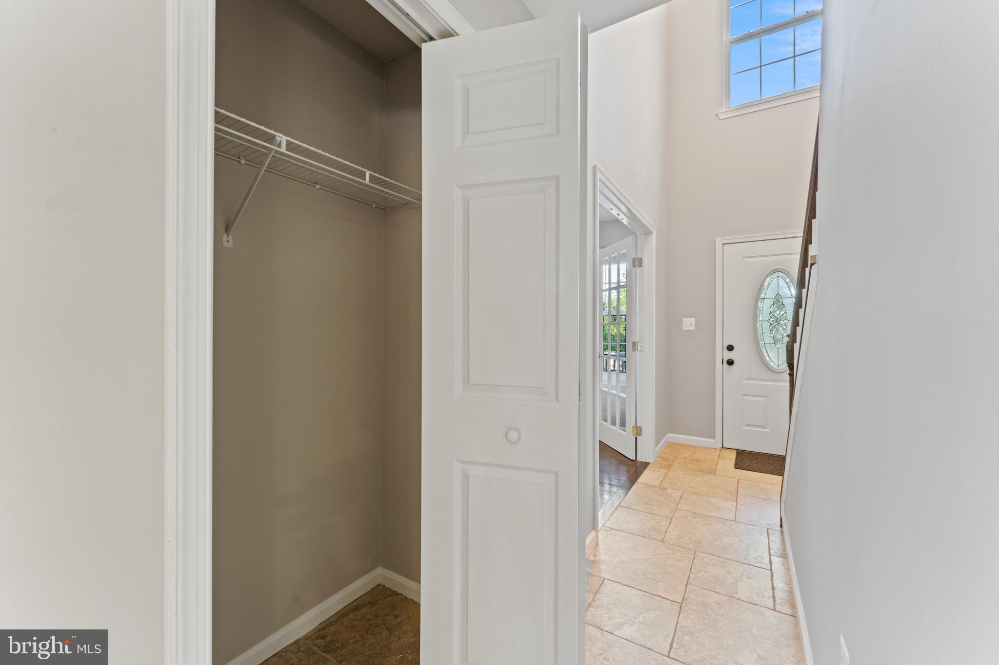 1555 Wall Drive Pasadena, MD 21122 - Photo 18 of 46 a view of a hallway with wooden floor