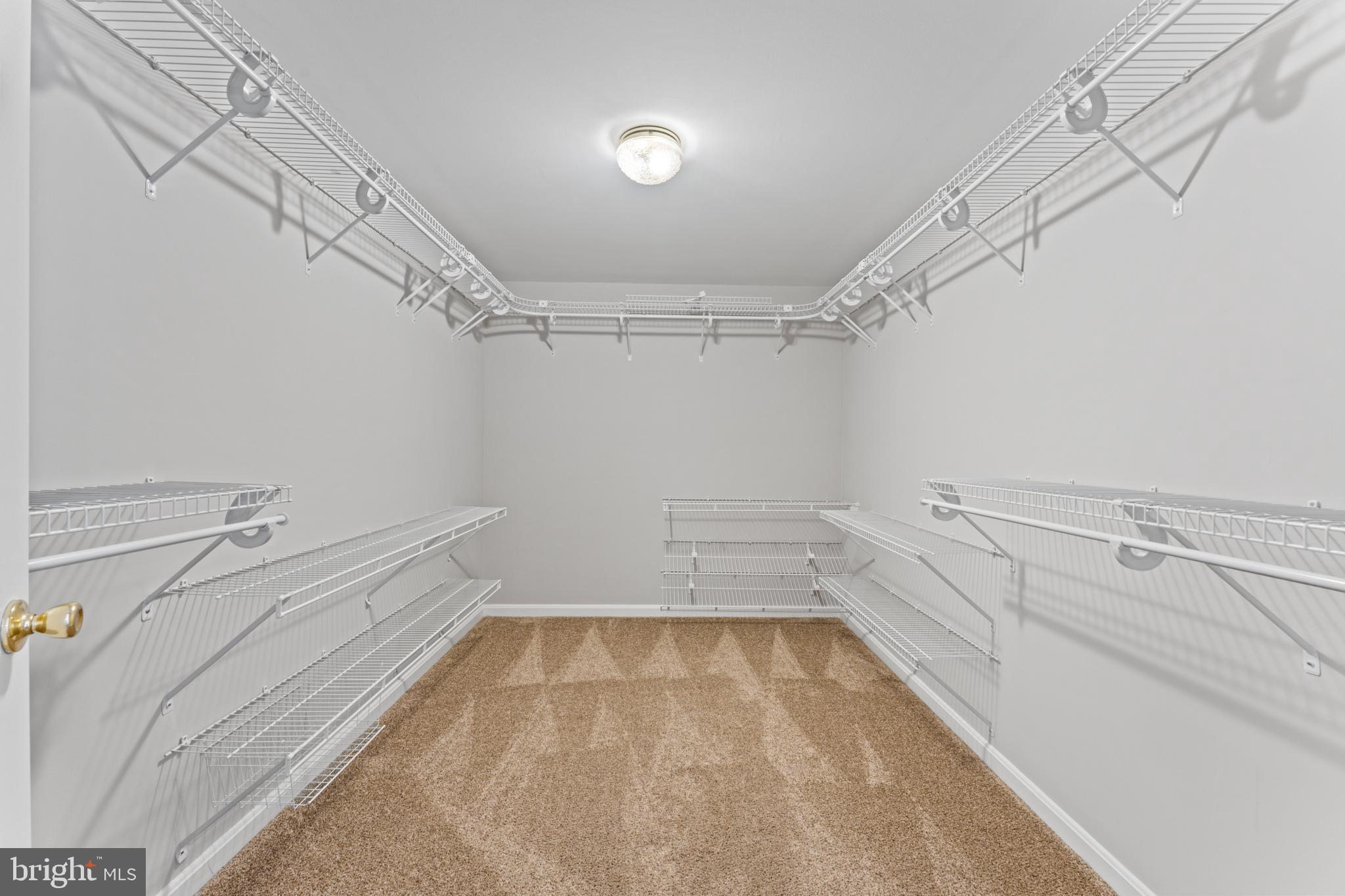 1555 Wall Drive Pasadena, MD 21122 - Photo 21 of 46 a view of a room with racks on the wall