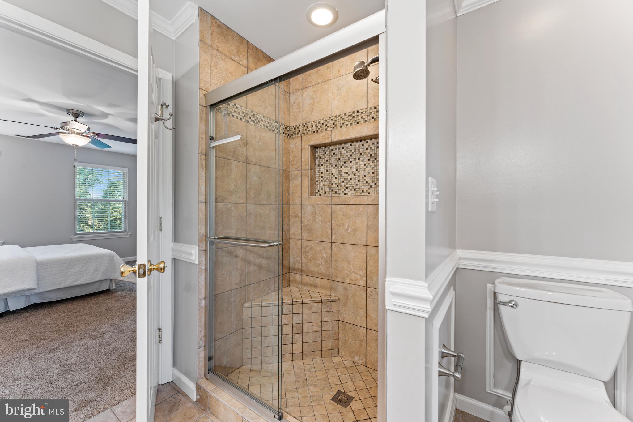 1555 Wall Drive Pasadena, MD 21122 - Photo 23 of 46 a bathroom with a shower and a toilet