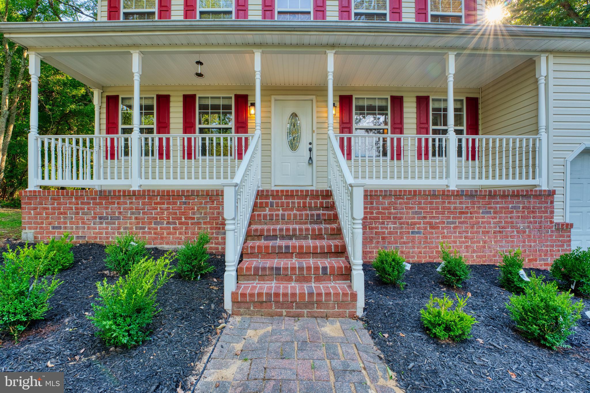 1555 Wall Drive Pasadena, MD 21122 - Photo 3 of 46 a front view of a house with entryway