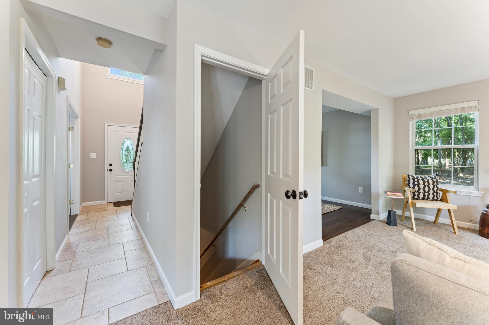 1555 Wall Drive Pasadena, MD 21122 - Photo 32 of 46 a view of a hallway with bathroom and glass door