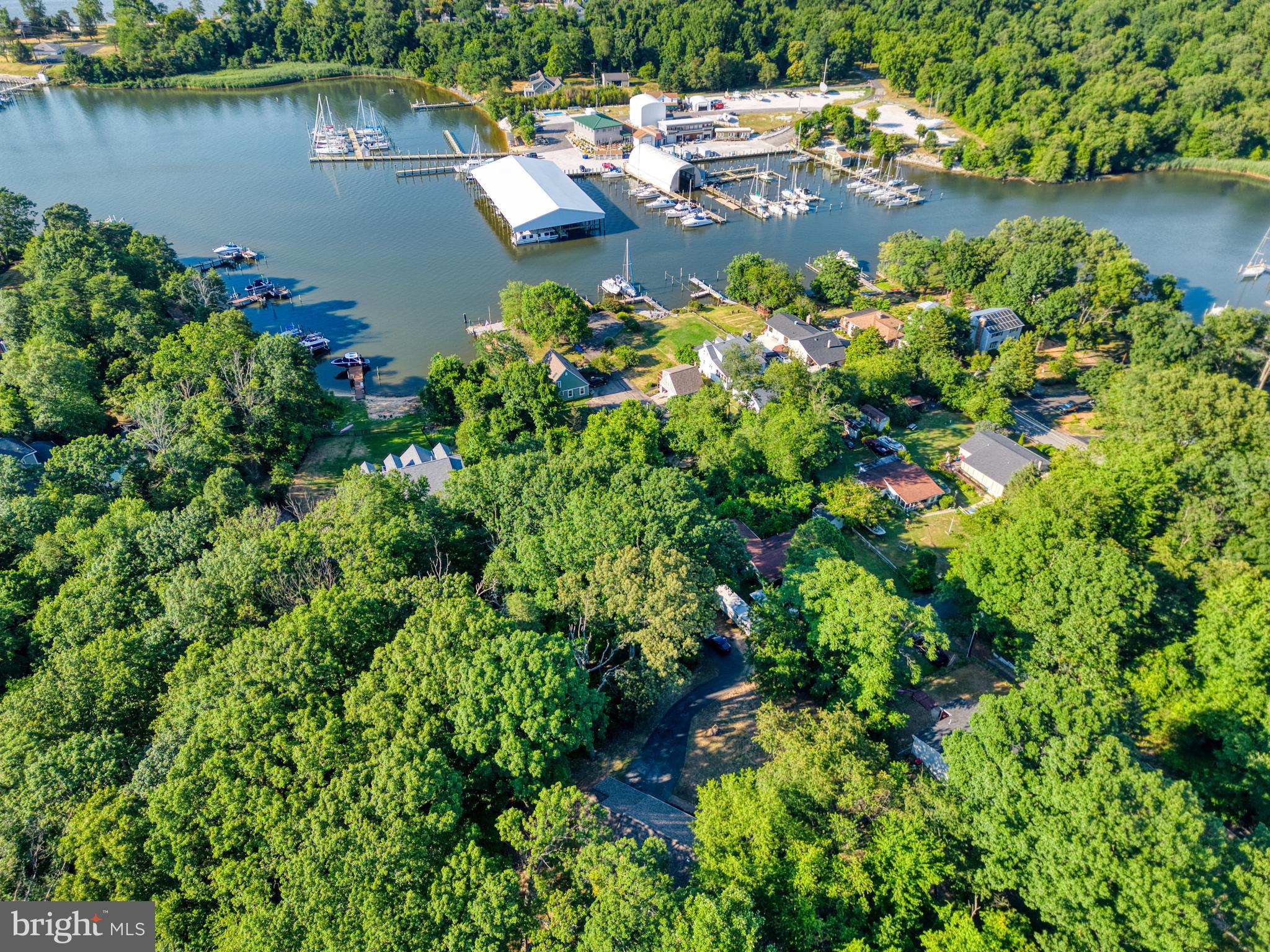 1555 Wall Drive Pasadena, MD 21122 - Photo 43 of 46 a view of a lake with outdoor space