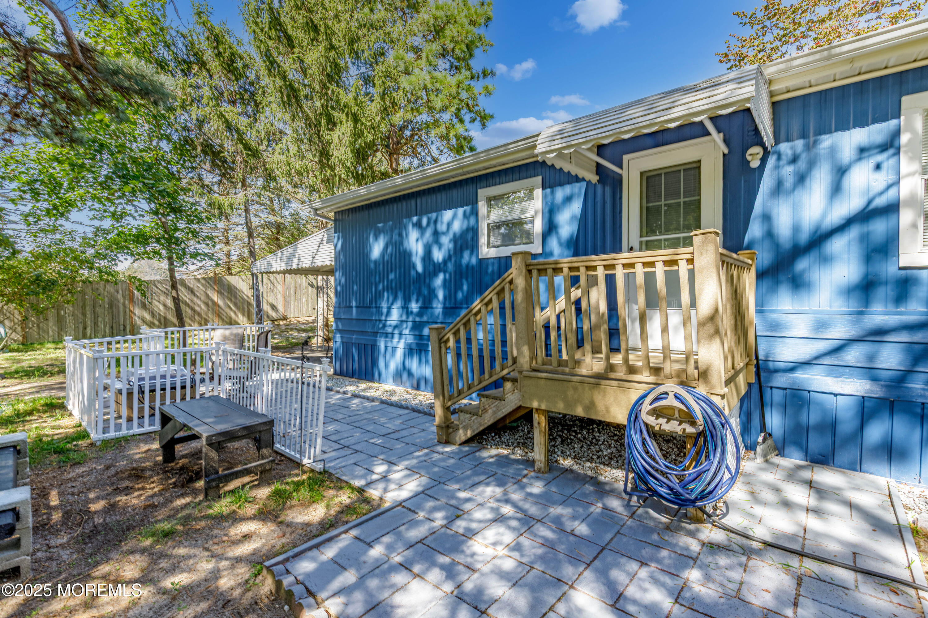 209 Mockingbird Way Whiting, NJ 08759 - Photo 22 of 26 a view of backyard with deck and outdoor seating