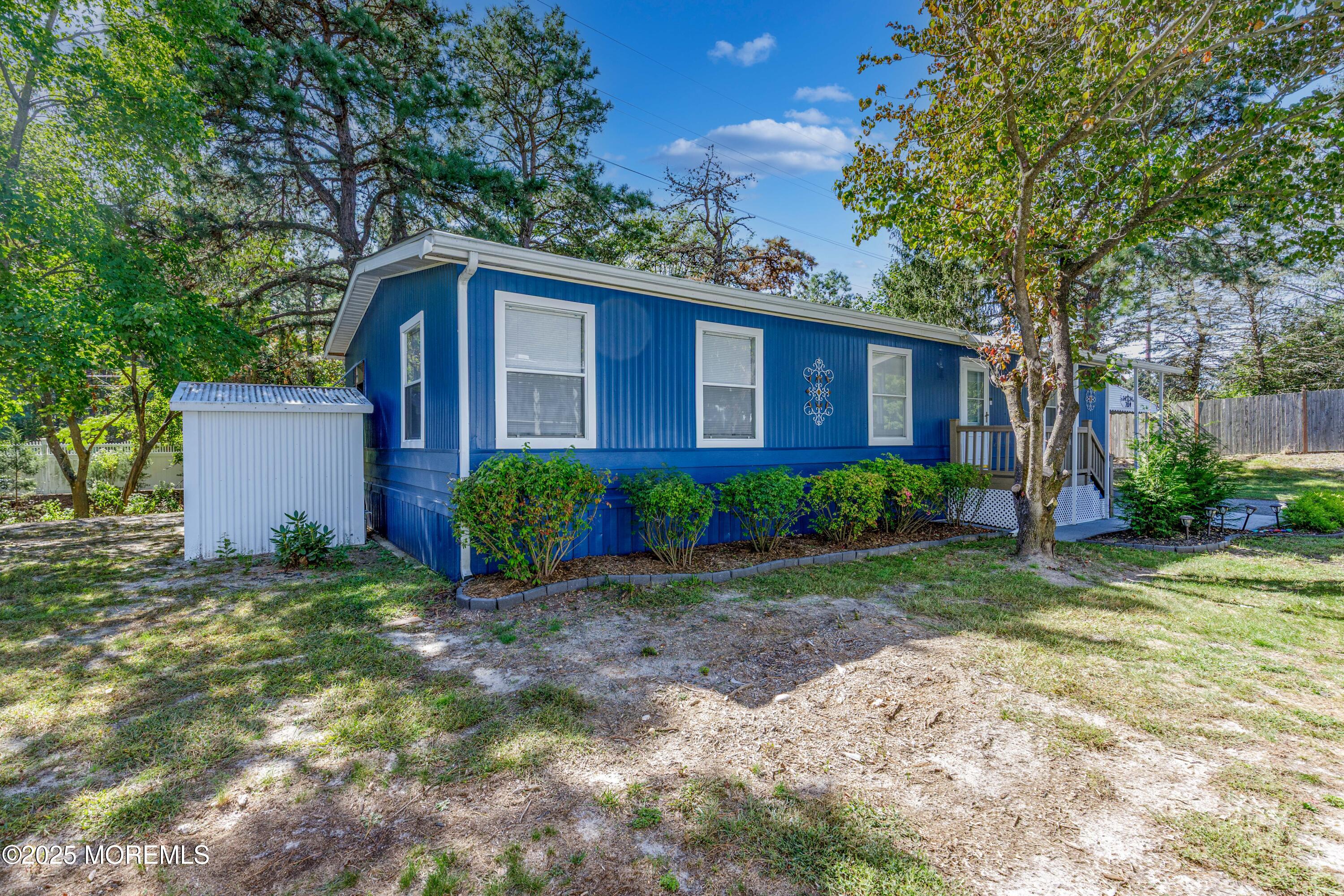 209 Mockingbird Way Whiting, NJ 08759 - Photo 3 of 26 a view of a house with a yard