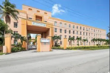 a view of a building with a street