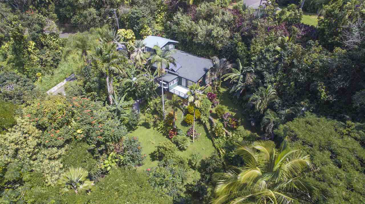 900 Haiku Road Haiku, HI 96708 - Photo 2 of 15 an aerial view of a house with a yard