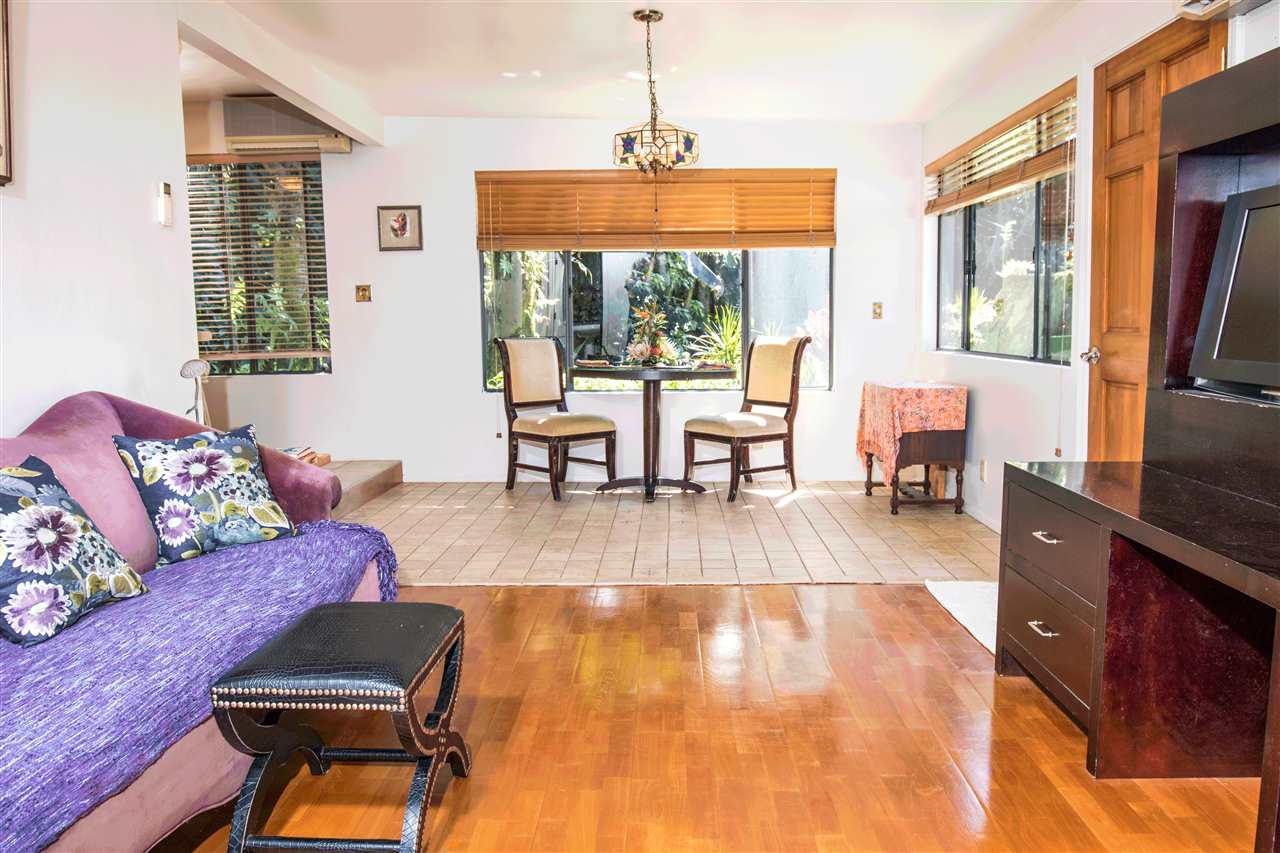 900 Haiku Road Haiku, HI 96708 - Photo 6 of 15 a living room with furniture and a wooden floor