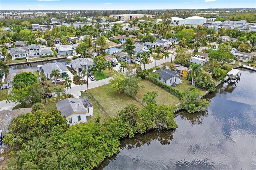 531 13th Street North Naples, FL 34102 - Photo 11 of 13 an aerial view of residential houses with outdoor space