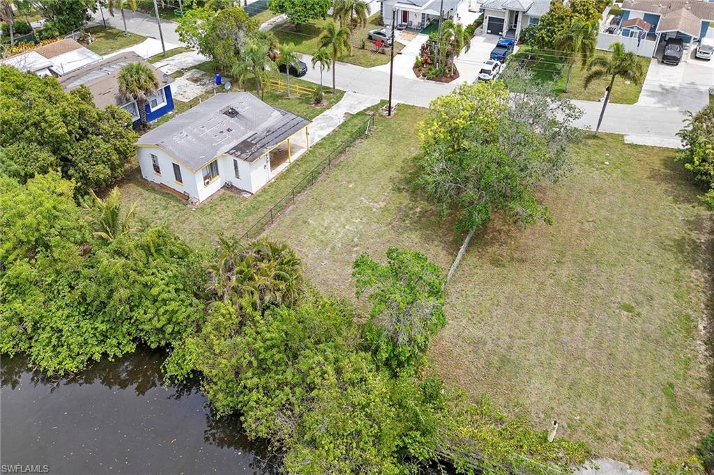 531 13th Street North Naples, FL 34102 - Photo 13 of 13 an aerial view of residential house with outdoor space and trees all around