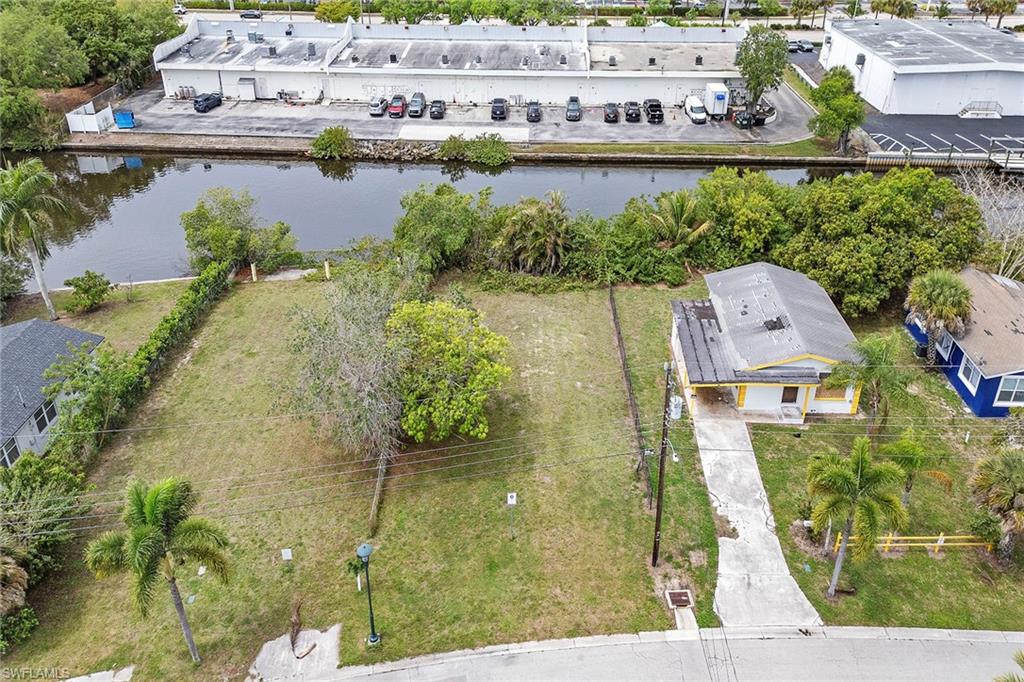 531 13th Street North Naples, FL 34102 - Photo 2 of 13 an aerial view of a house with a lake view