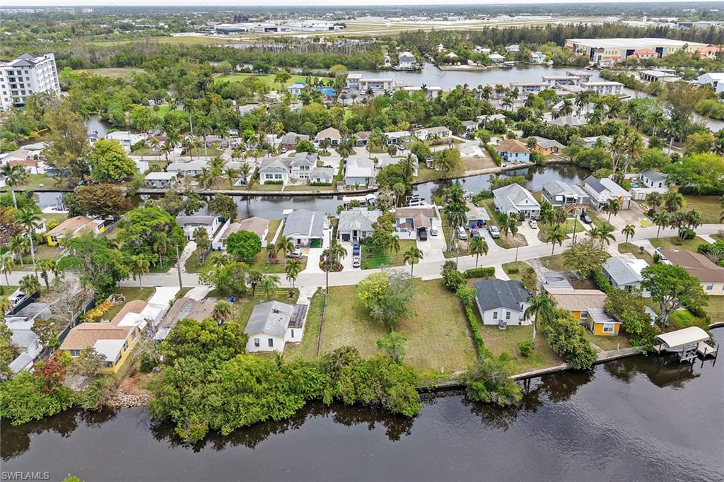 531 13th Street North Naples, FL 34102 - Photo 8 of 13 an aerial view of a city with lots of residential buildings