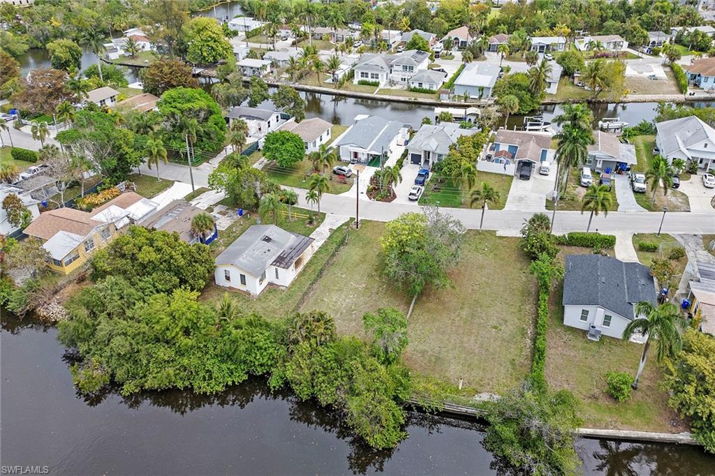 531 13th Street North Naples, FL 34102 - Photo 9 of 13 an aerial view of residential houses with outdoor space