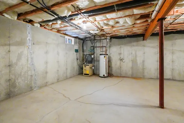 a view of a room with wooden walls