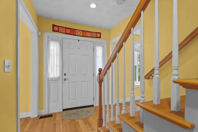 a view of front door with stairs