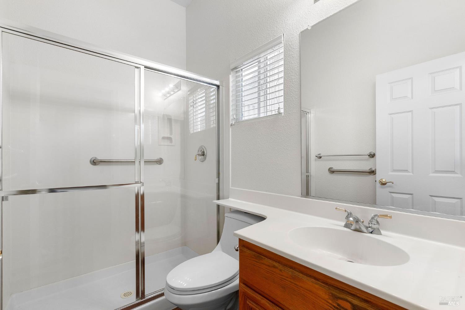 139 Cedar Ridge Drive Rio Vista, CA 94571 - Photo 29 of 52 Guest bathroom with walk-in shower and safety grab bar