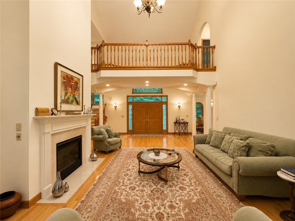 59 Kickapoo Valley Drive Charleston, IL 61920 - Photo 3 of 46 a living room with furniture and a fireplace