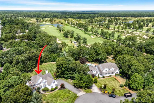 a view of lake with green space