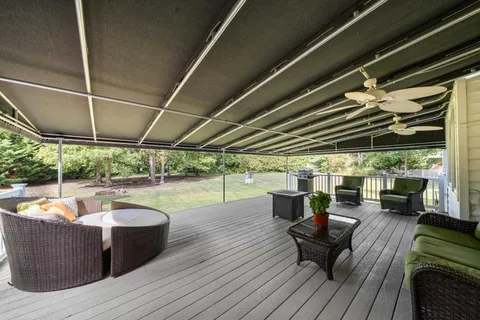 a view of a patio with swimming pool