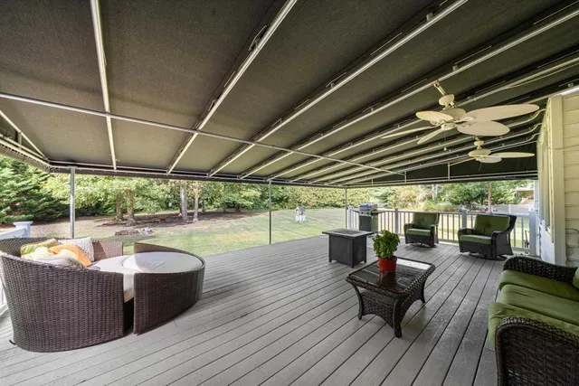 a view of a patio with swimming pool