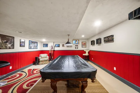 a living room with furniture and flat screen tv