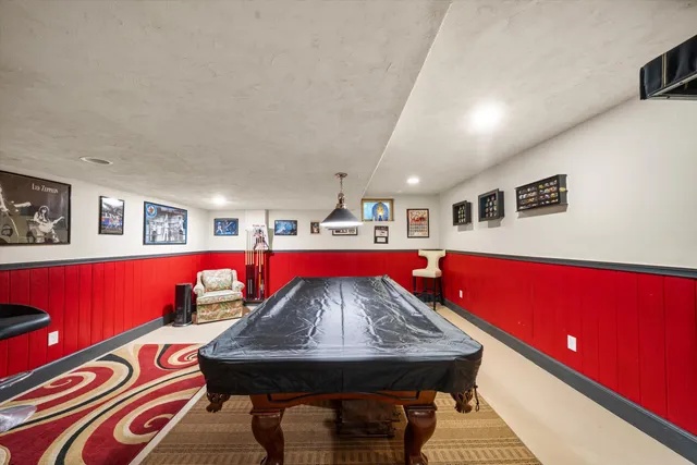 a living room with furniture and flat screen tv