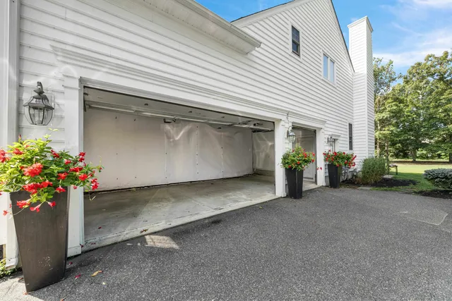 a view of a house with a garage