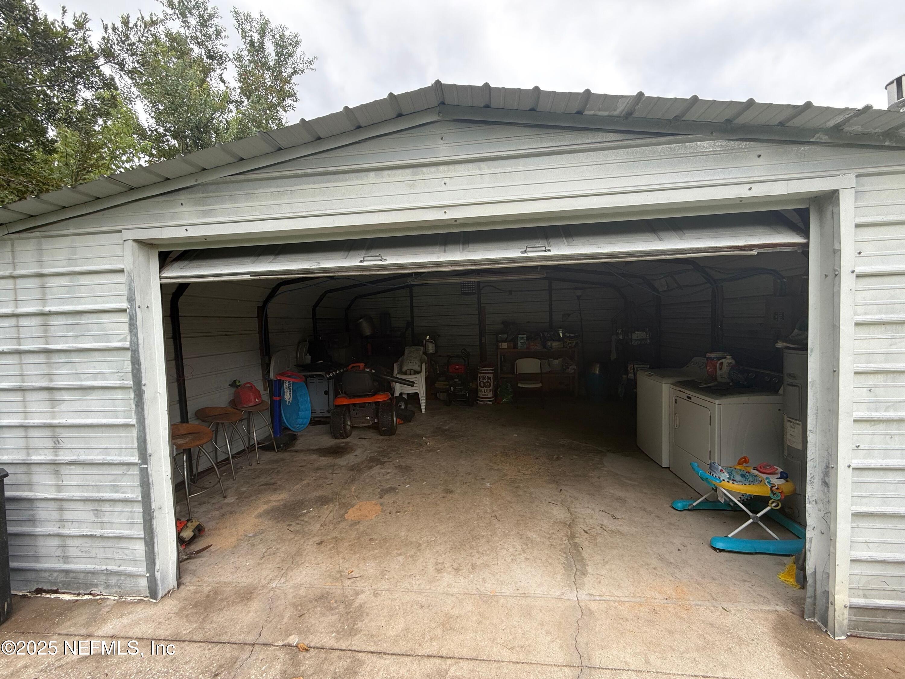 239 Pine Tree Trail Crescent City, FL 32112 - Photo 18 of 21 a view of a car parking garage