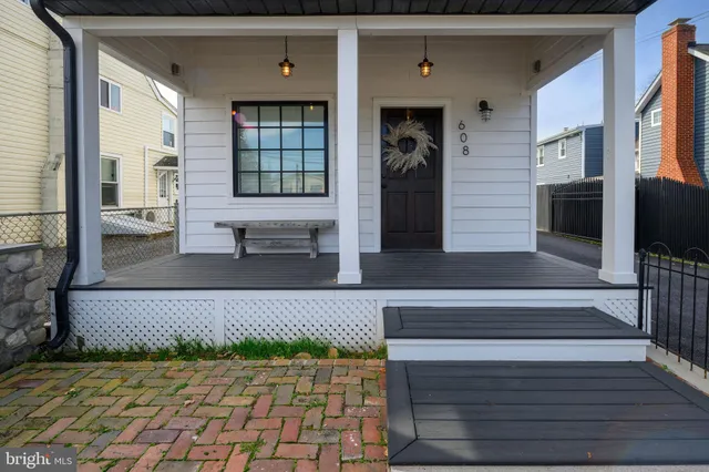 a living room with a couch and a fireplace