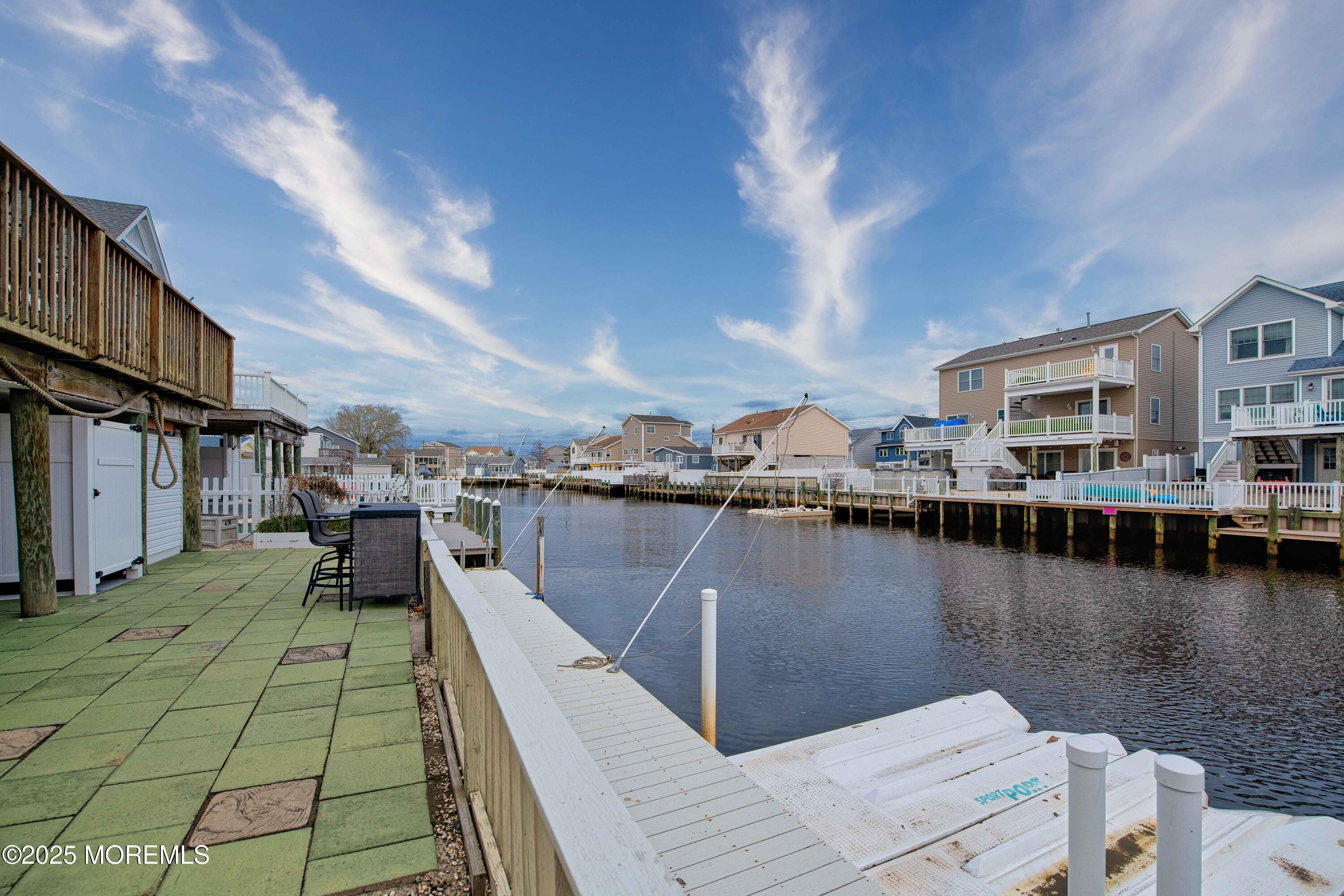 45 Sylvia Lane Manahawkin, NJ 08050 - Photo 22 of 36 a view of a lake with outdoor seating