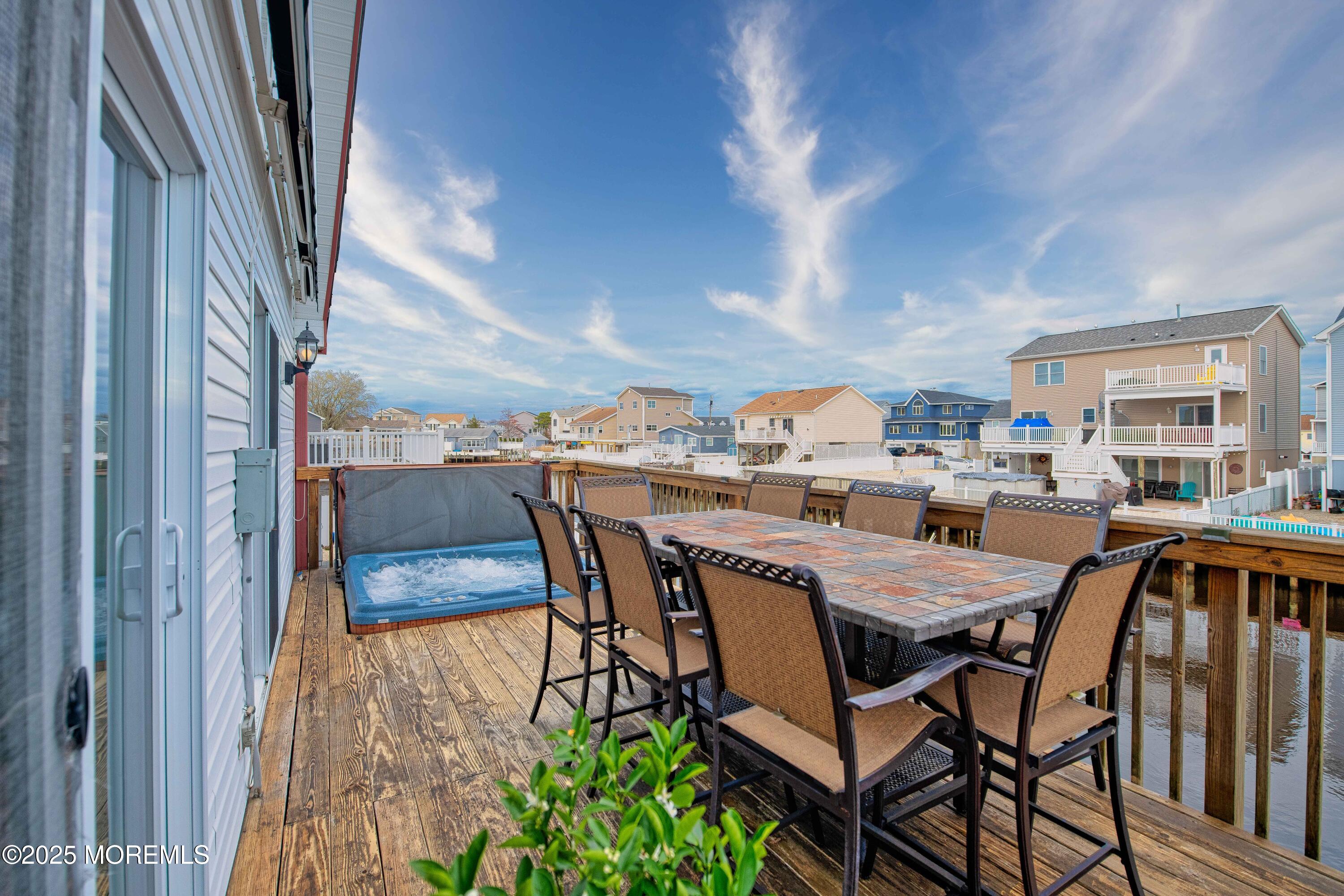 45 Sylvia Lane Manahawkin, NJ 08050 - Photo 28 of 36 a view of a dining room with furniture and wooden floor