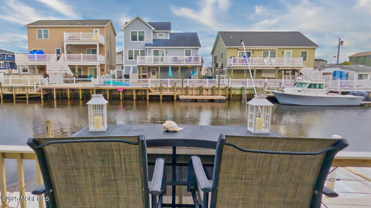 45 Sylvia Lane Manahawkin, NJ 08050 - Photo 36 of 36 a view of a lake with building in front of it